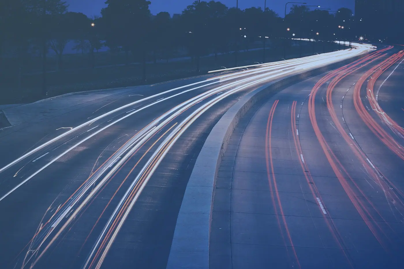 Light trails from fast-moving traffic at night